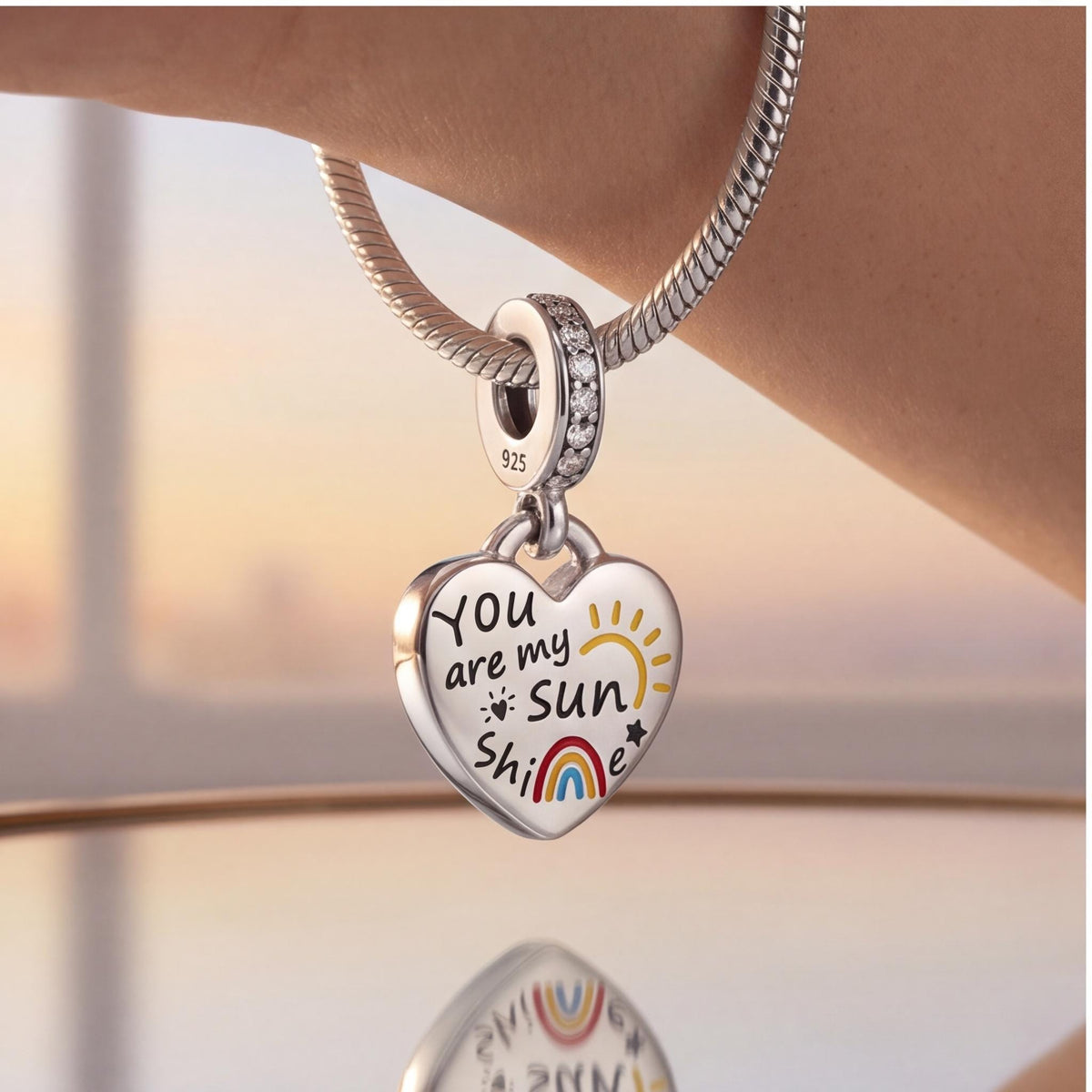 Sunshine Heart Dangle close-up on a bracelet