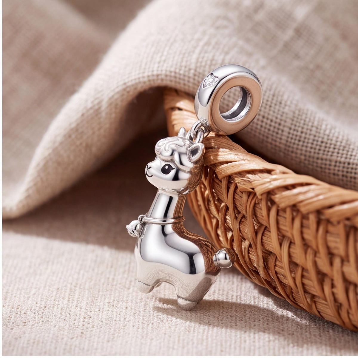 Alpaca Dangle Charm close-up on a bracelet