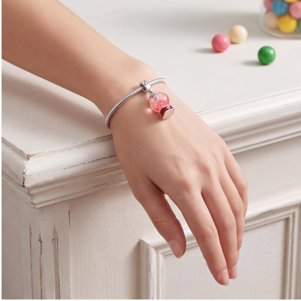Gumball Machine Charm worn on a charm bracelet