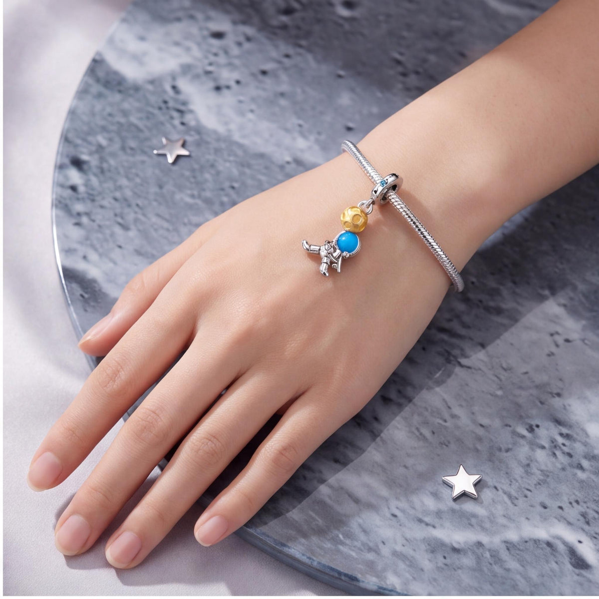 Astronaut Dangle Charm worn on a charm bracelet