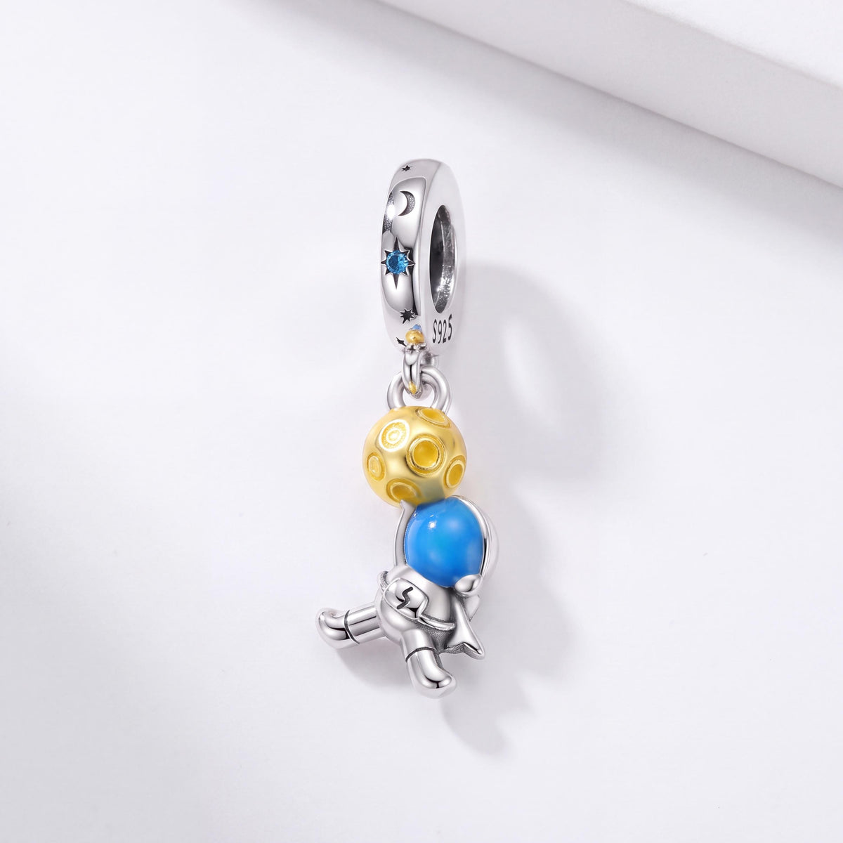 Astronaut Dangle Charm in 925 sterling silver with blue and yellow enamel and sparkling stones