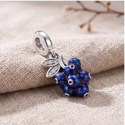 Blueberry Dangle Charm on a silver charm bracelet