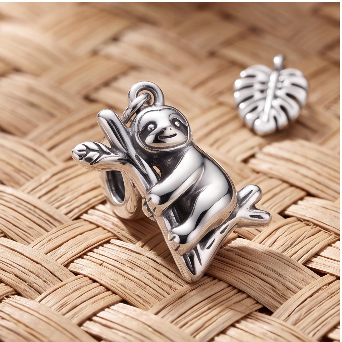 Climbing Sloth Dangle Charm styled as a gift
