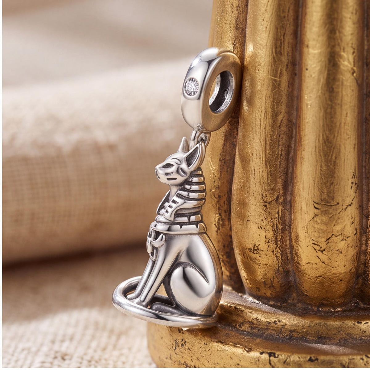 Egyptian Cat Charm on a silver charm bracelet