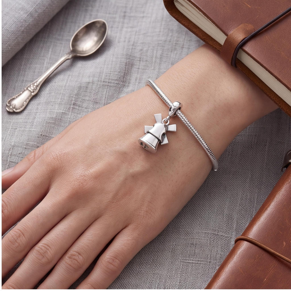 Dutch Windmill Charm close-up on a bracelet