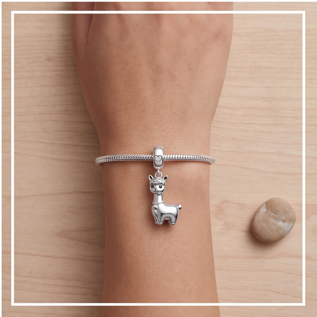 Alpaca Dangle Charm on a silver charm bracelet