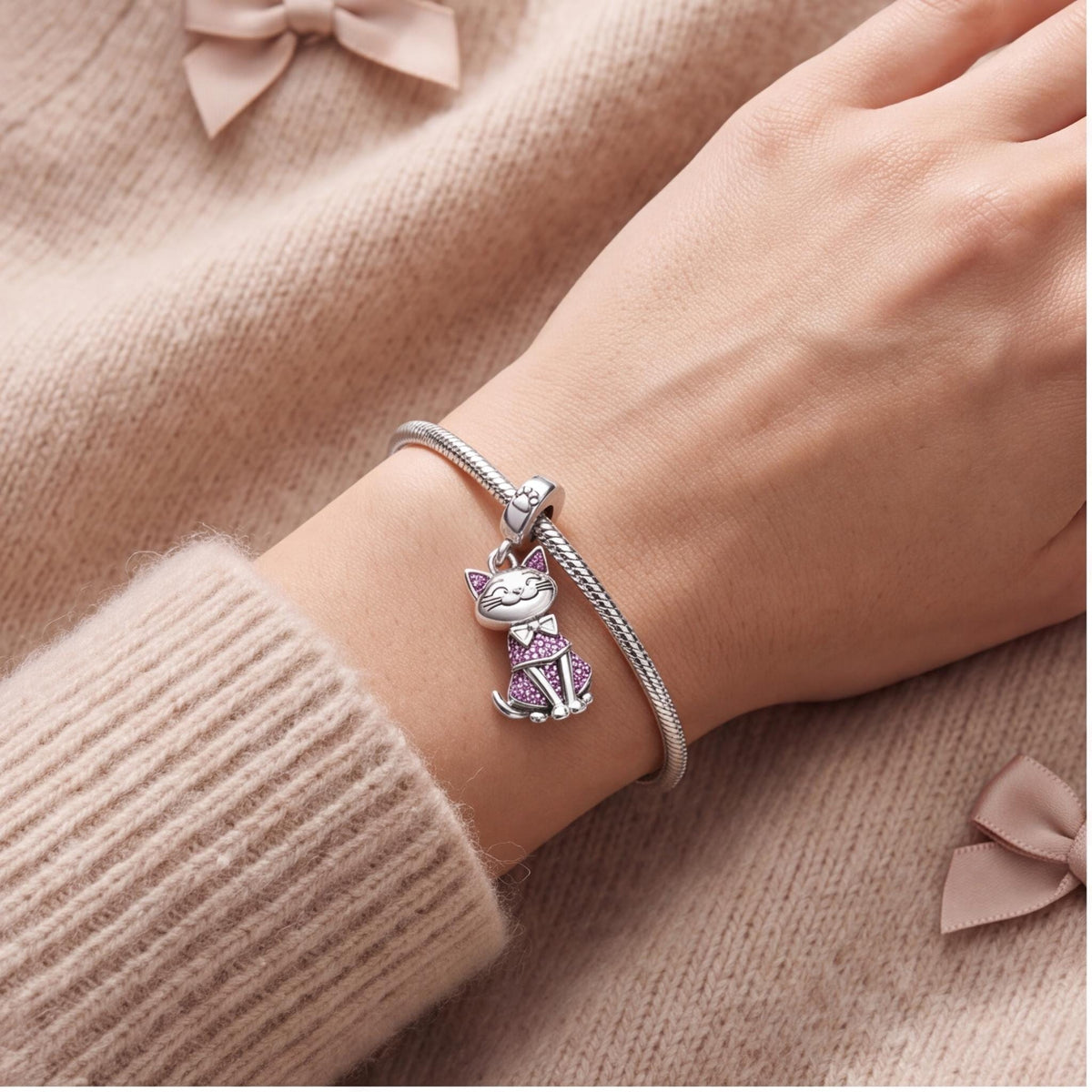 Pink Cat Dangle Charm close-up on a bracelet