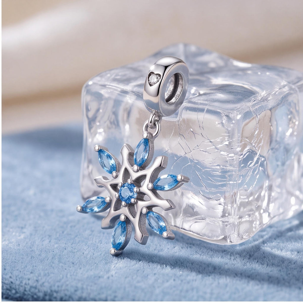 Blue Snowflake Charm styled as a gift