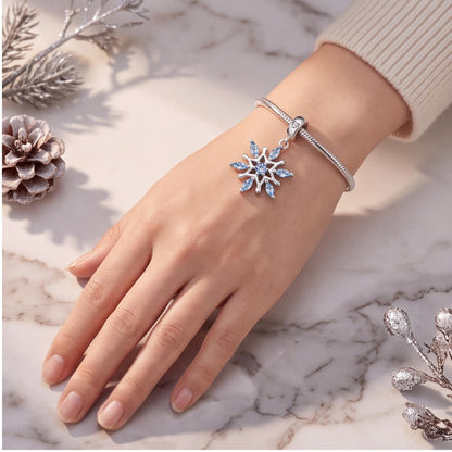 Blue Snowflake Charm close-up on a bracelet