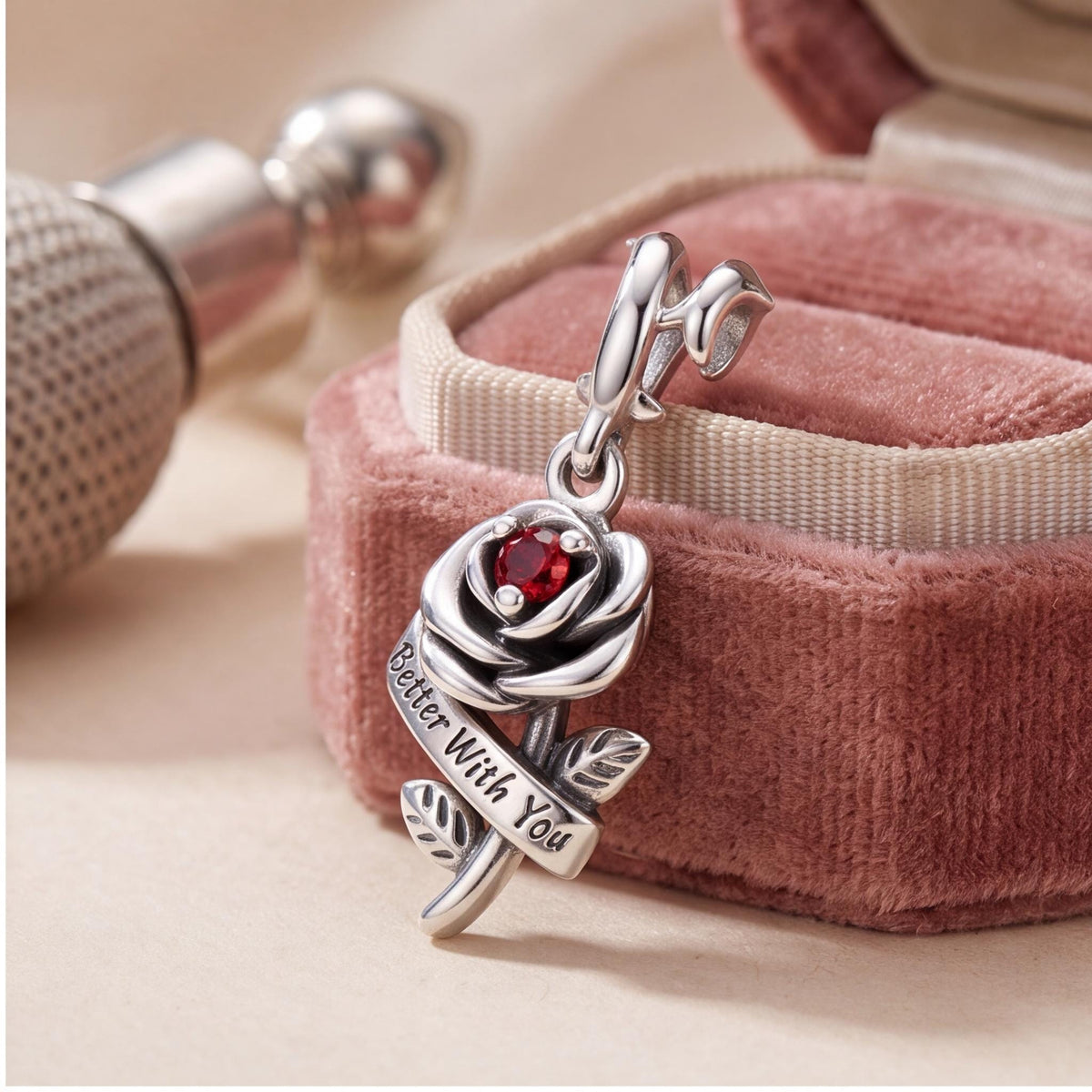 Red Rose Dangle Charm styled as a gift
