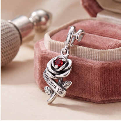 Red Rose Dangle Charm styled as a gift