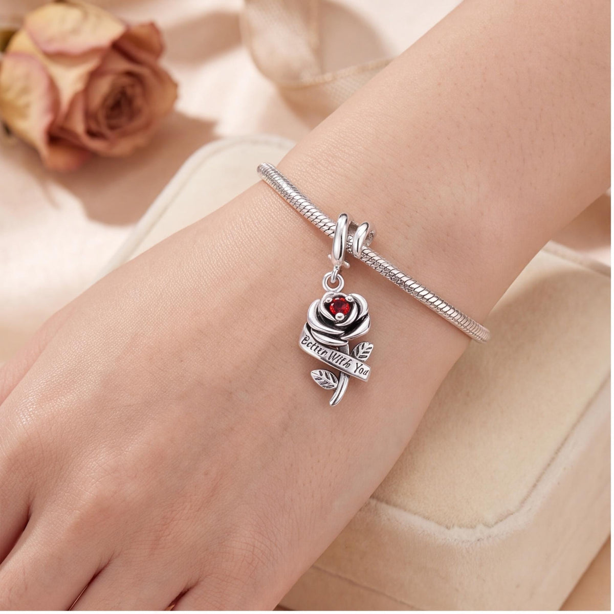 Red Rose Dangle Charm worn on a charm bracelet
