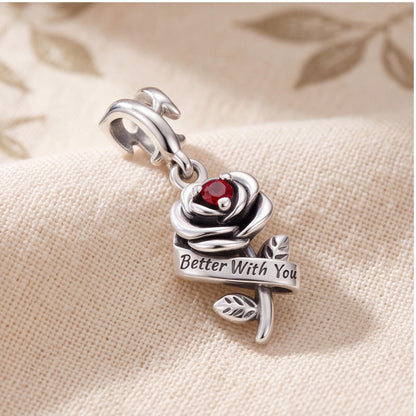 Red Rose Dangle Charm on a silver charm bracelet