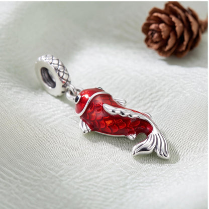Red Koi Fish Dangle on a silver charm bracelet