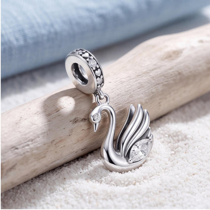 Swan Dangle Charm on a silver charm bracelet