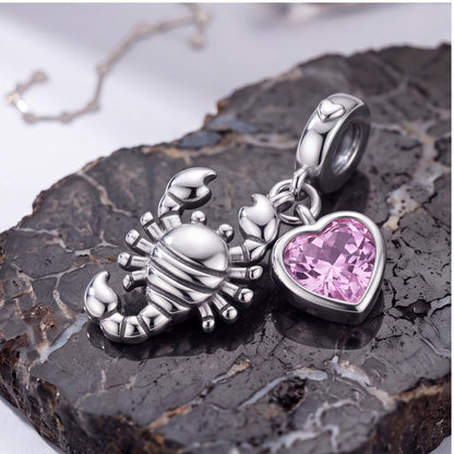 Scorpio Zodiac Charm on a silver charm bracelet