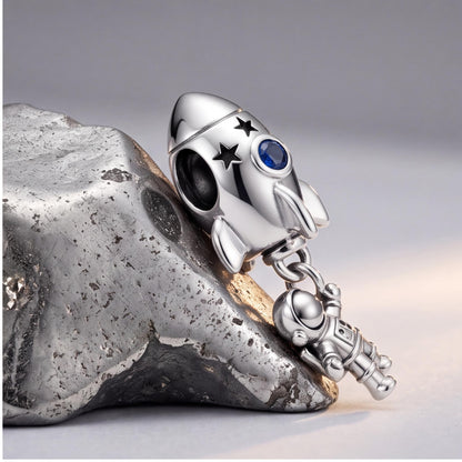 Rocket Astronaut Charm styled as a gift