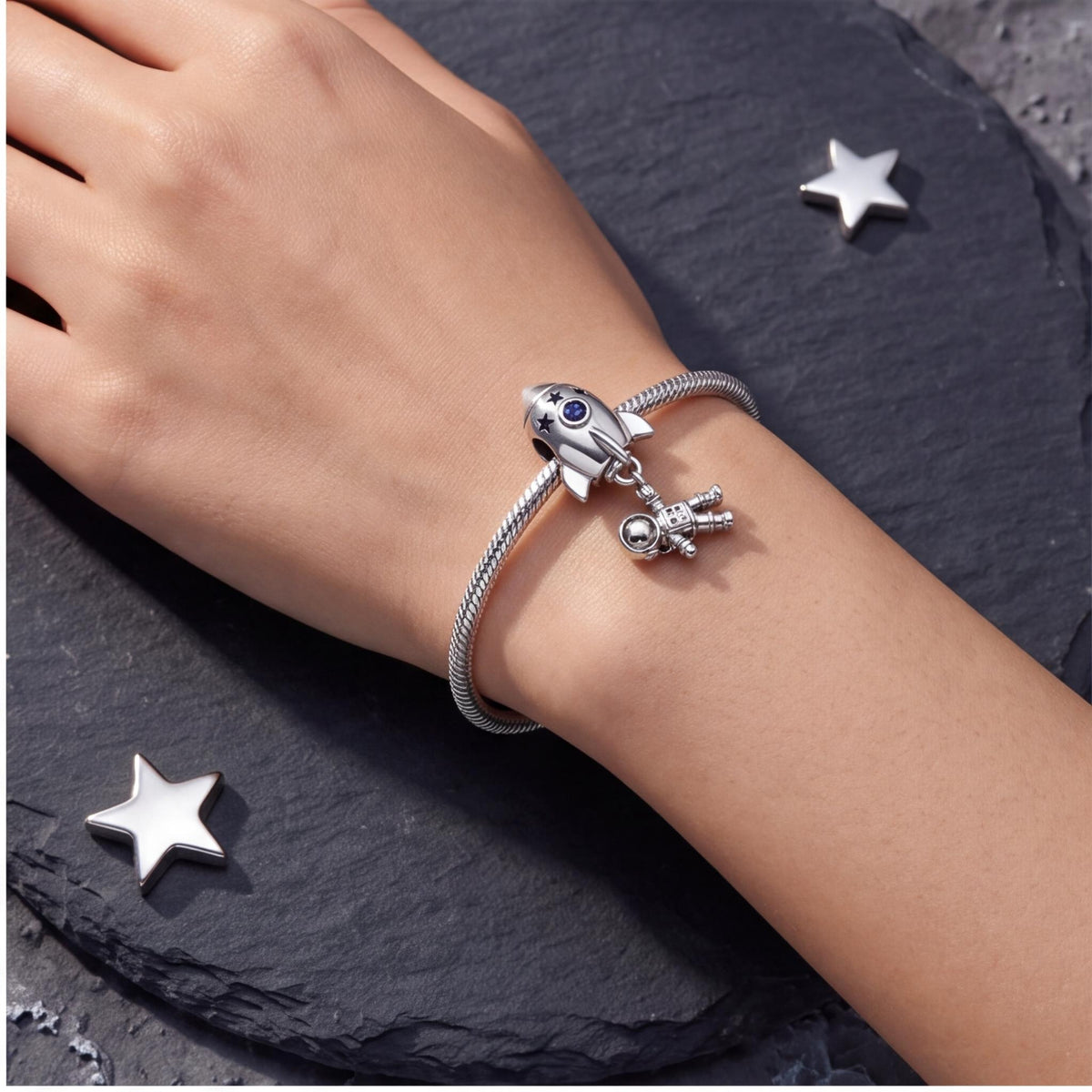 Rocket Astronaut Charm worn on a charm bracelet
