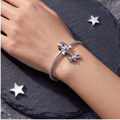Rocket Astronaut Charm worn on a charm bracelet