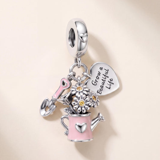 Gardening Triple Dangle Charm in 925 sterling silver with pink and yellow enamel and sparkling stones