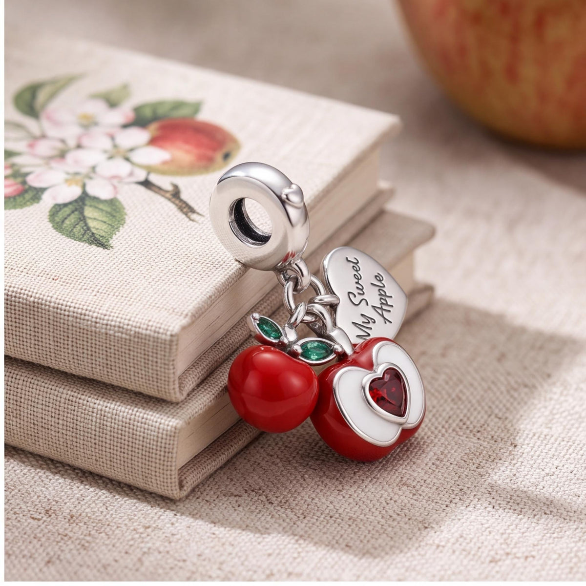 Red Apple Dangle Charm on a silver charm bracelet