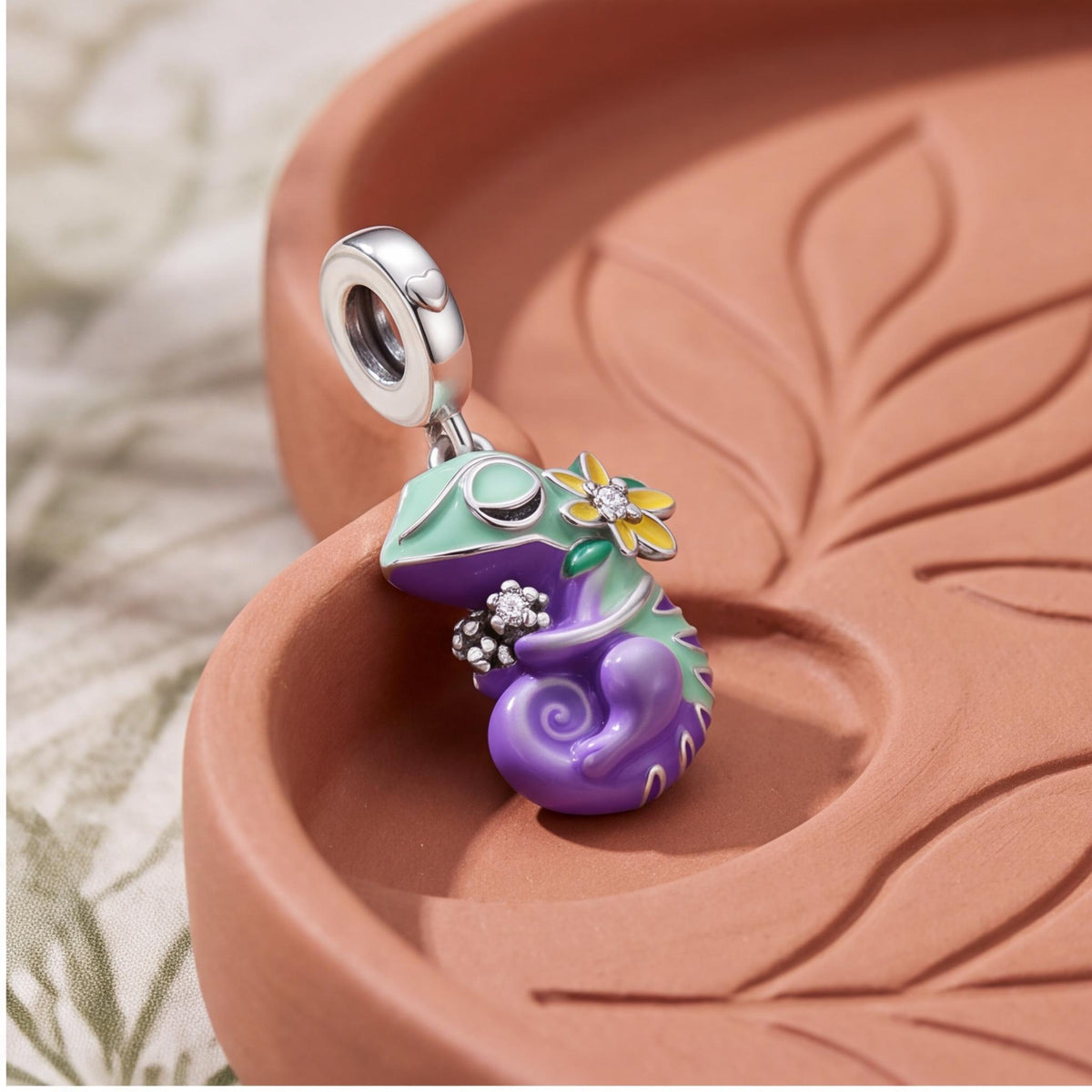 Chameleon Dangle Charm close-up on a bracelet