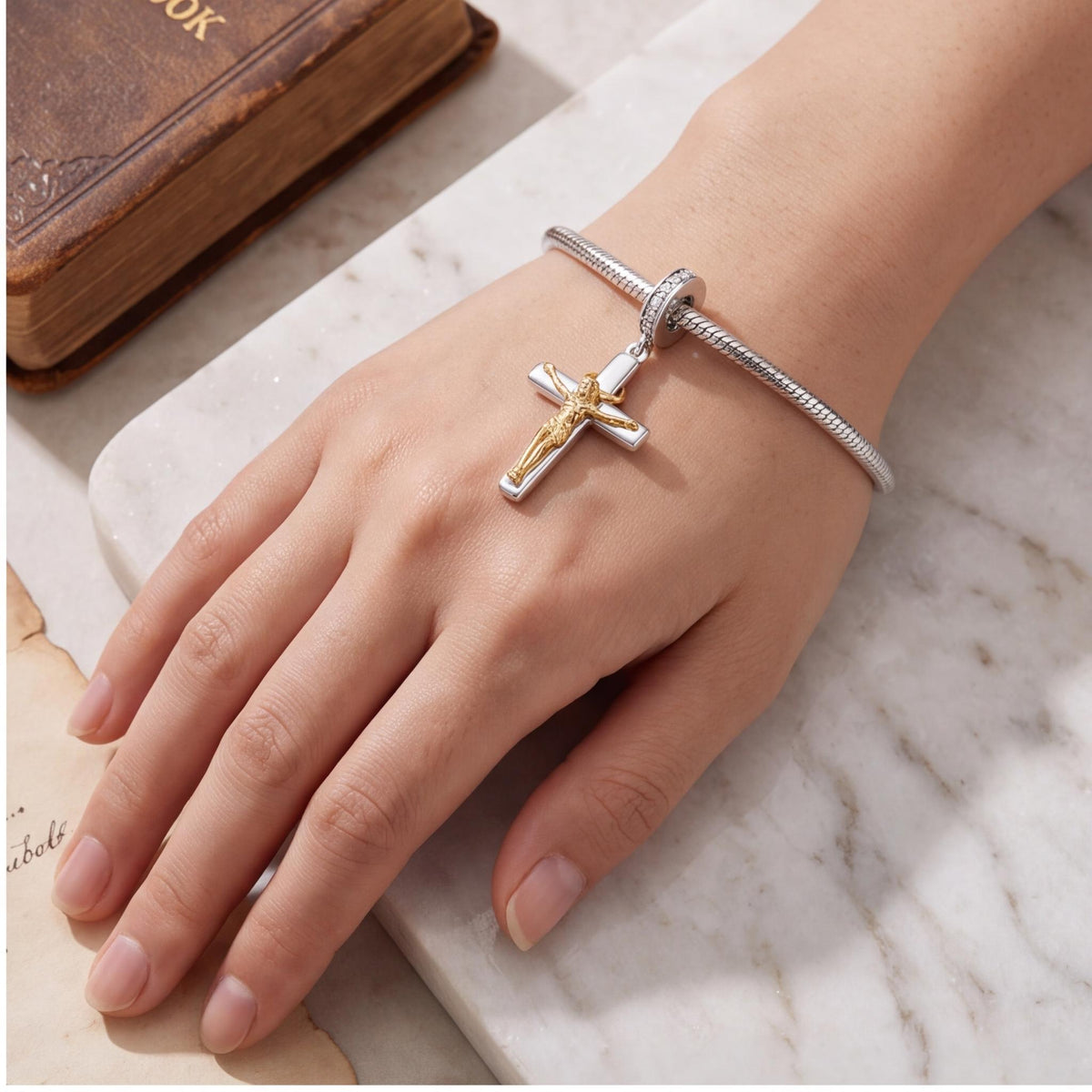 Crucifix Dangle Charm worn on a charm bracelet