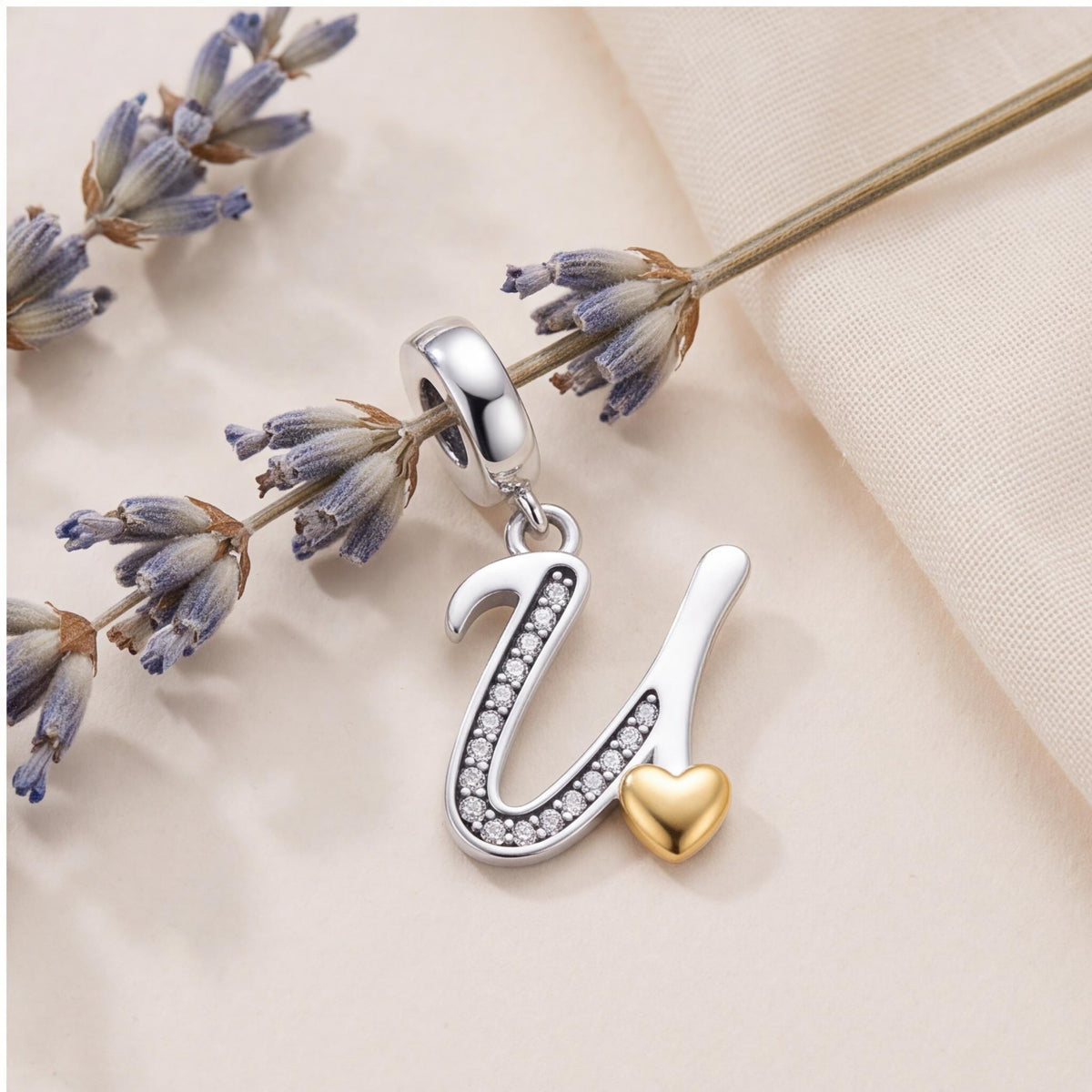 Letter U Dangle Charm styled as a gift