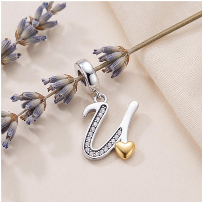 Letter U Dangle Charm styled as a gift