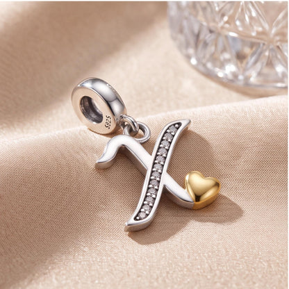 Letter X Initial Charm on a silver charm bracelet