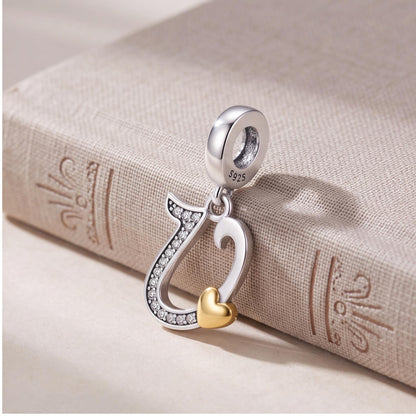 Letter U Heart Dangle on a silver charm bracelet