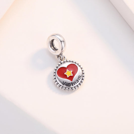 Vietnam Heart Star Dangle in 925 sterling silver with red and yellow enamel, fits European-style charm bracelets