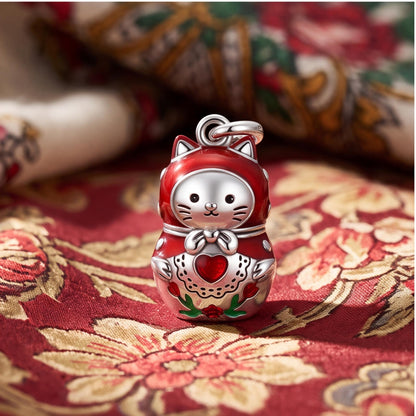 Cat Nesting Doll Charm on a silver charm bracelet