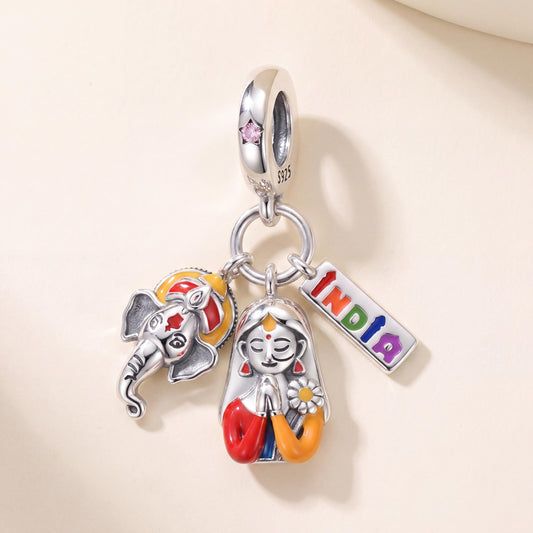 India Triple Dangle in 925 sterling silver with pink enamel and sparkling stones, fits European-style charm bracelets