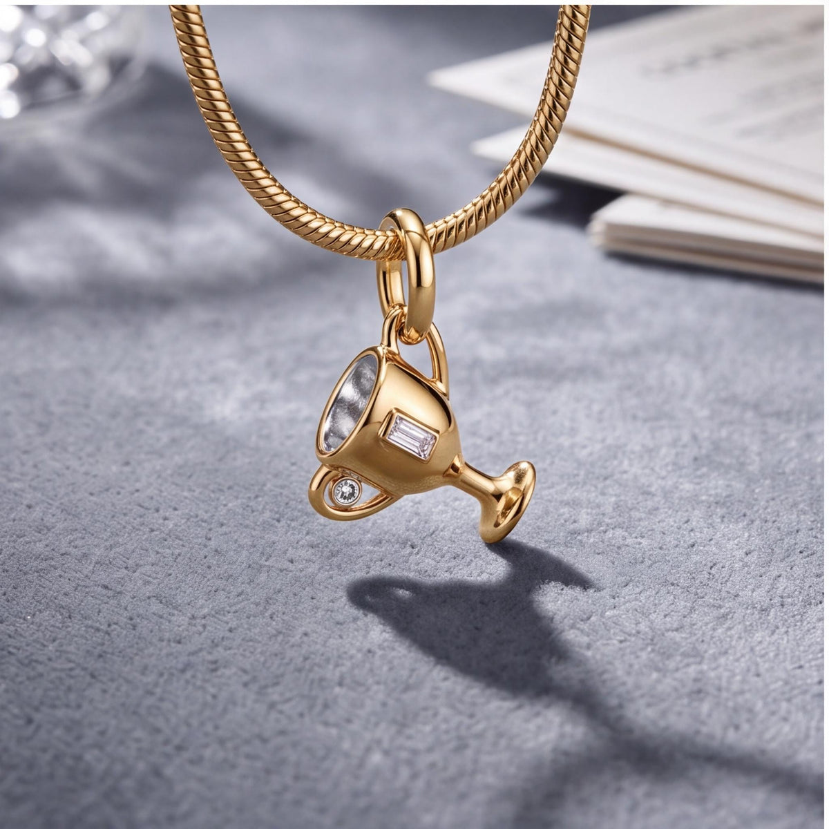 Trophy Cup Charm close-up on a bracelet