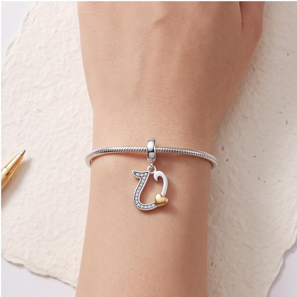Letter U Heart Dangle close-up on a bracelet