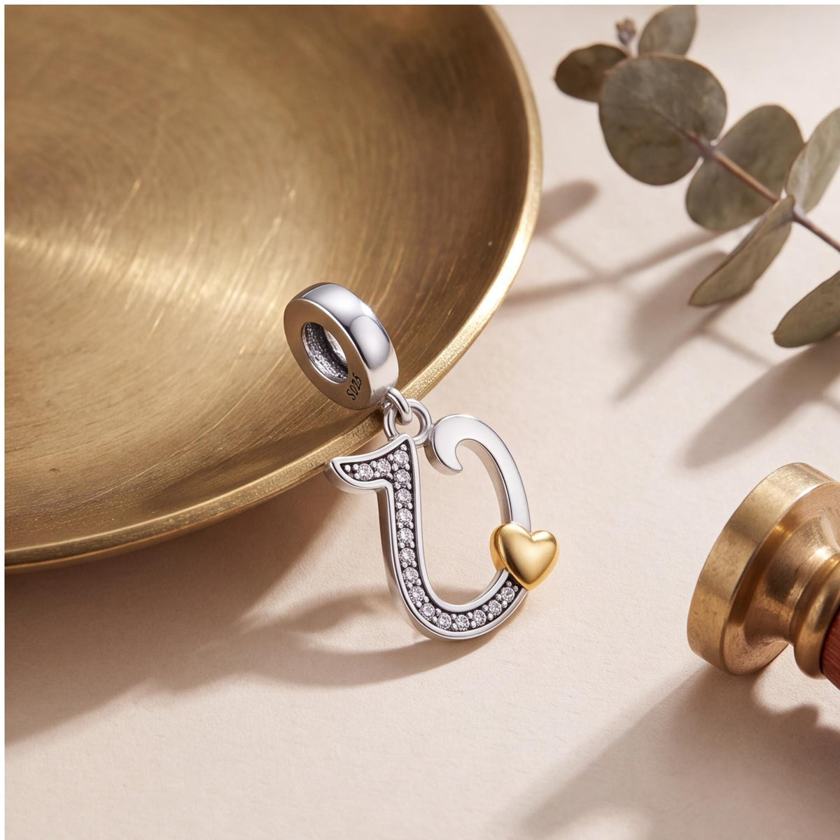 Letter U Heart Dangle styled as a gift