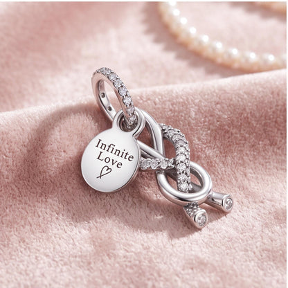 Infinite Love Charm on a silver charm bracelet