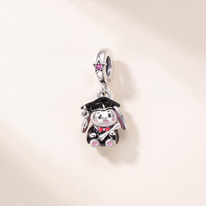 Graduation Bunny Dangle in 925 sterling silver with pink and black enamel and sparkling stones
