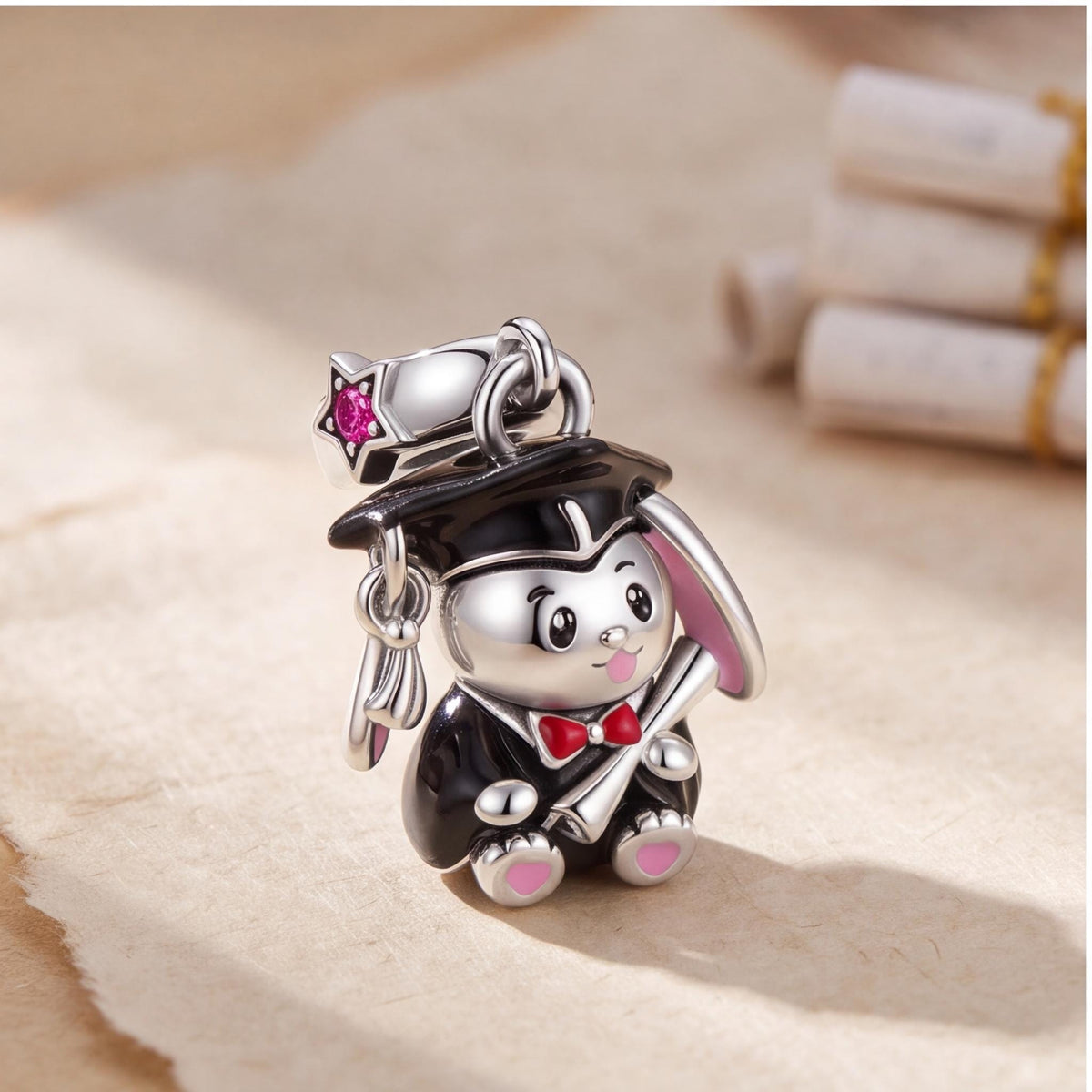 Graduation Bunny Dangle on a silver charm bracelet