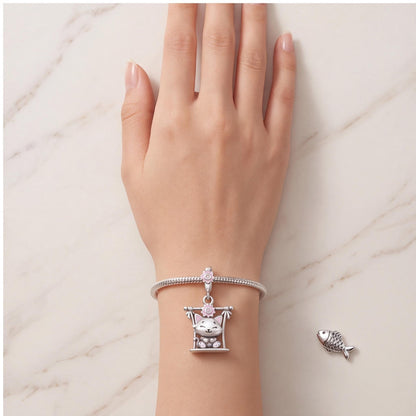 Swing Cat Dangle Charm worn on a charm bracelet