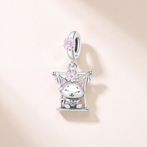 Swing Cat Dangle Charm in 925 sterling silver with pink enamel and sparkling stones, fits European-style charm bracelets
