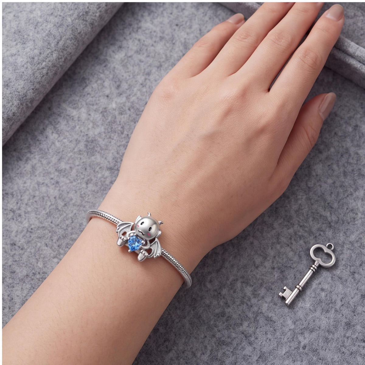 Little Devil Charm close-up on a bracelet