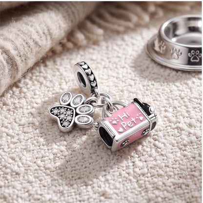Pet Carrier Paw Charm on a silver charm bracelet