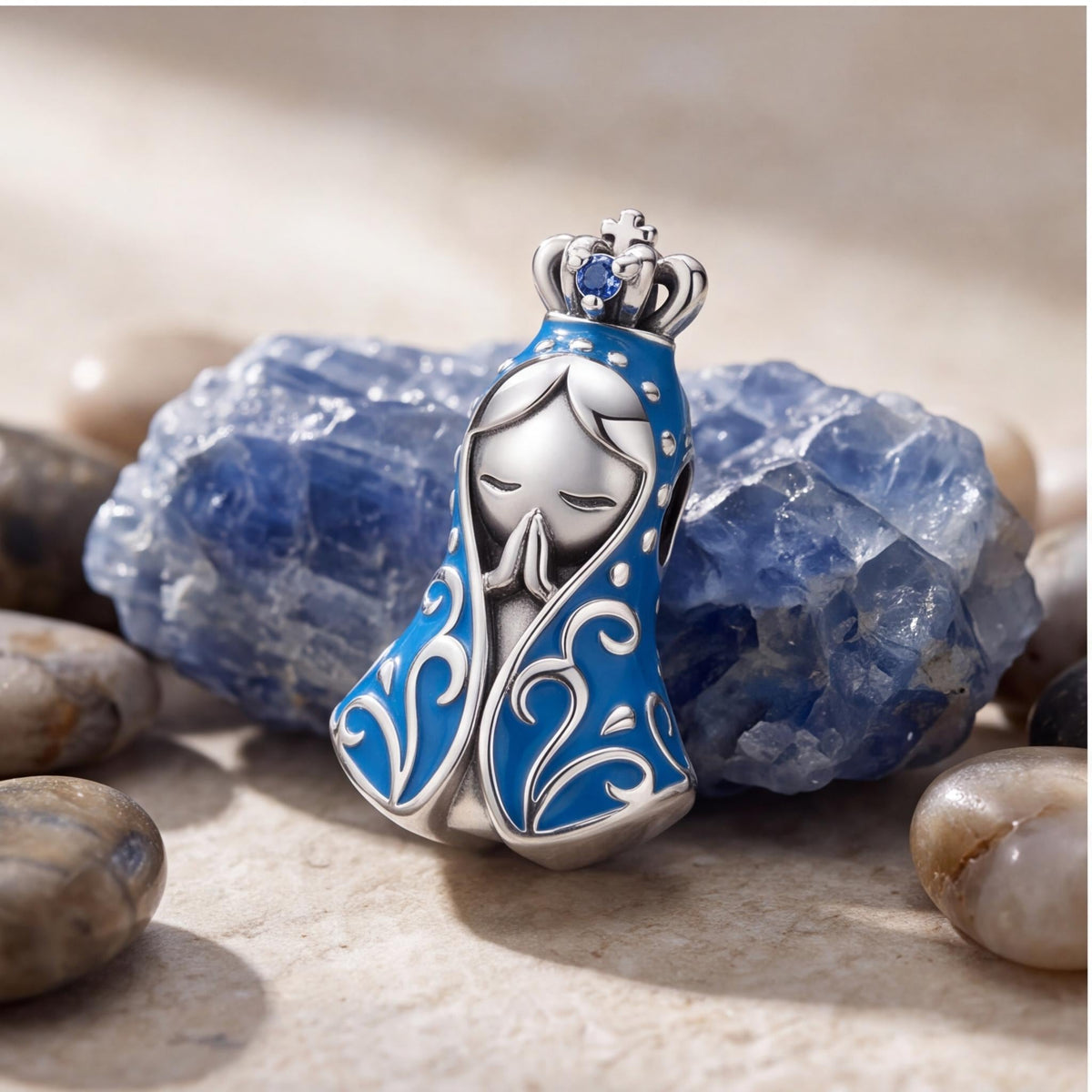 Blue Praying Virgin Mary Charm on a silver charm bracelet
