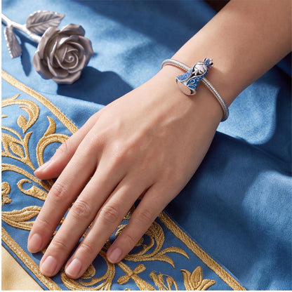Blue Praying Virgin Mary Charm close-up on a bracelet