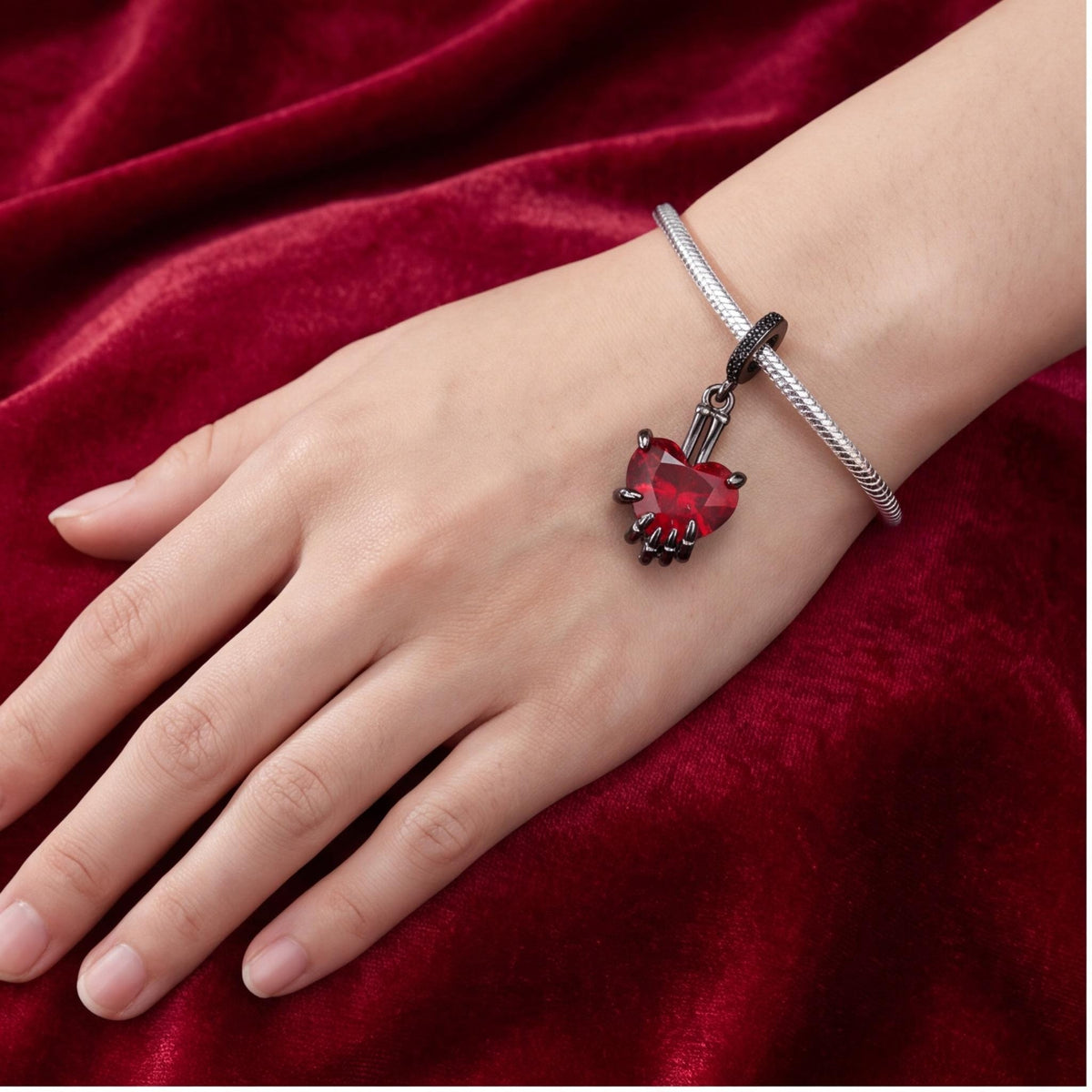 Skeleton Hand Heart Dangle styled as a gift