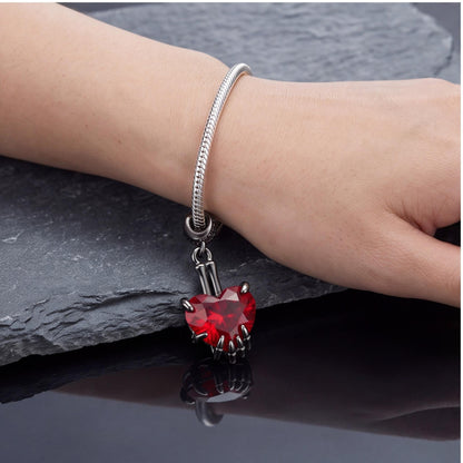 Skeleton Hand Heart Dangle close-up on a bracelet