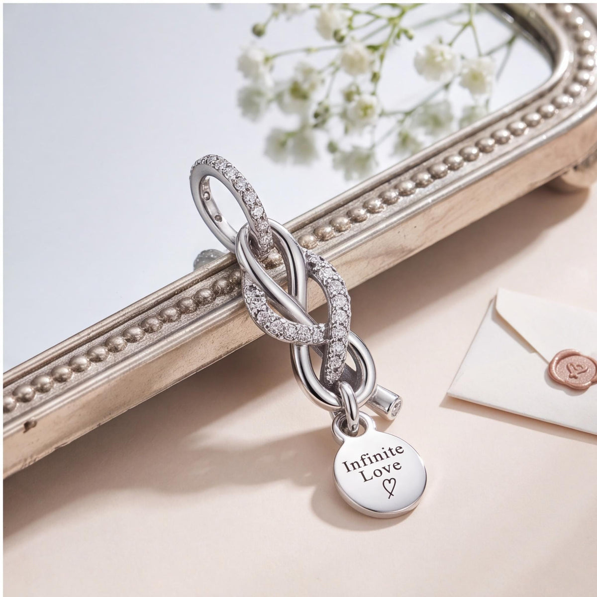 Infinite Love Charm styled as a gift
