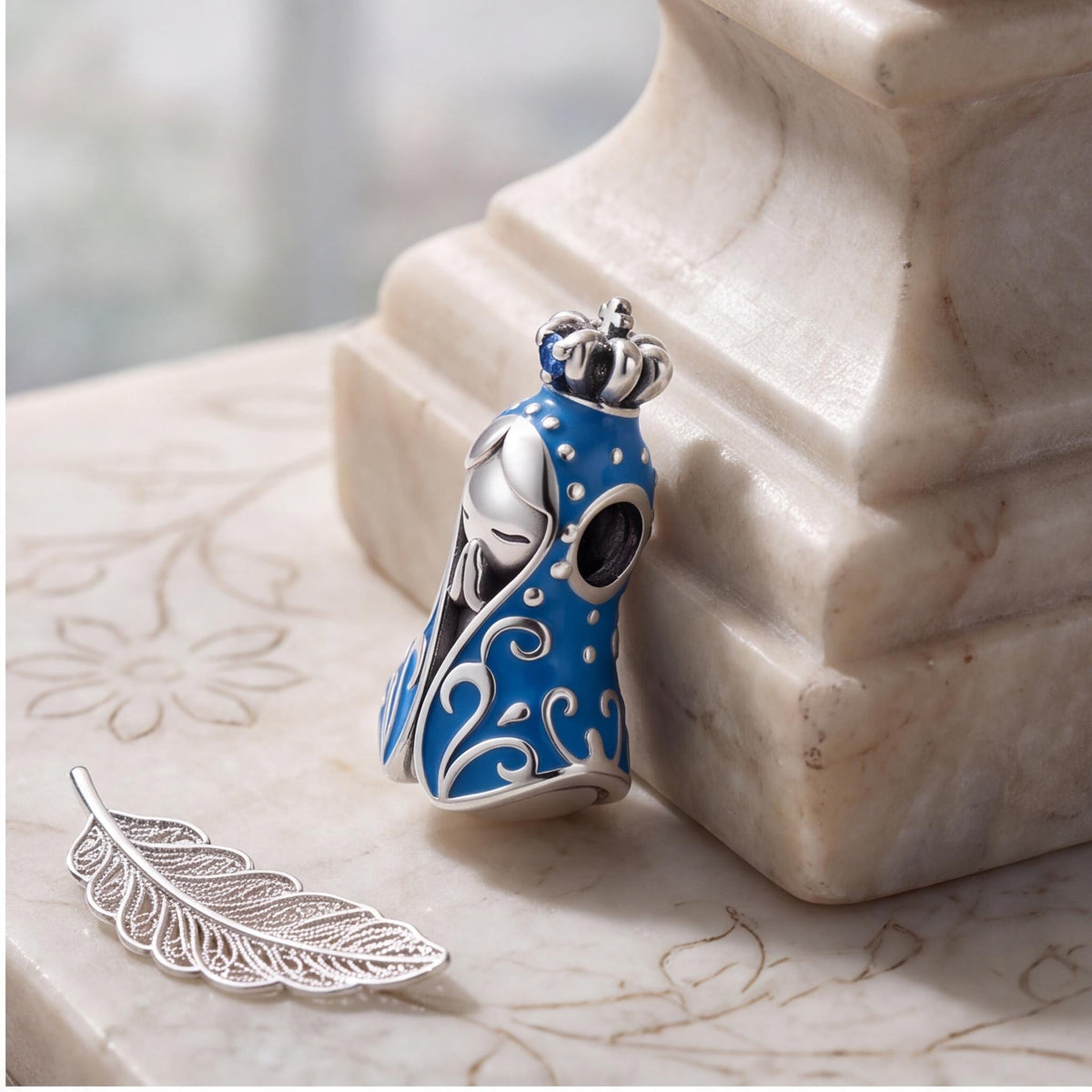 Blue Praying Virgin Mary Charm styled as a gift